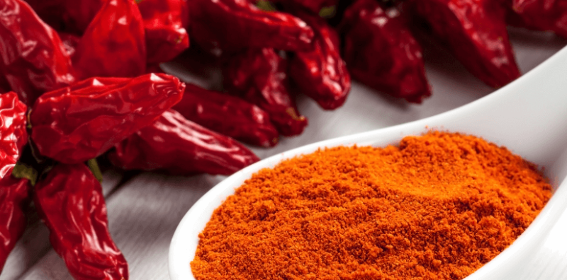 Pimentón spice, a vibrant and essential ingredient for paella, highlighted by La Salsamenta